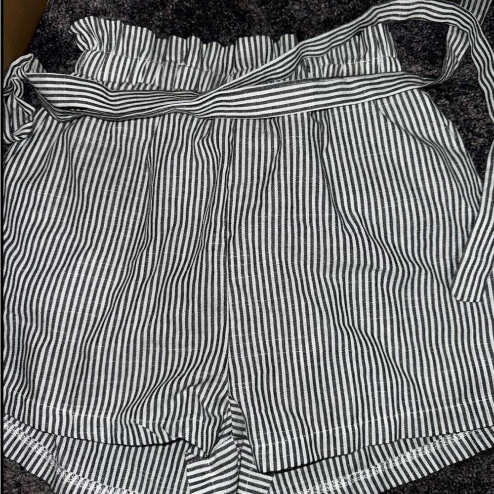 16 PCS- BAG OF CLOTHES FOR SALE, includes shorts, shirts, swimsuits, jeans.